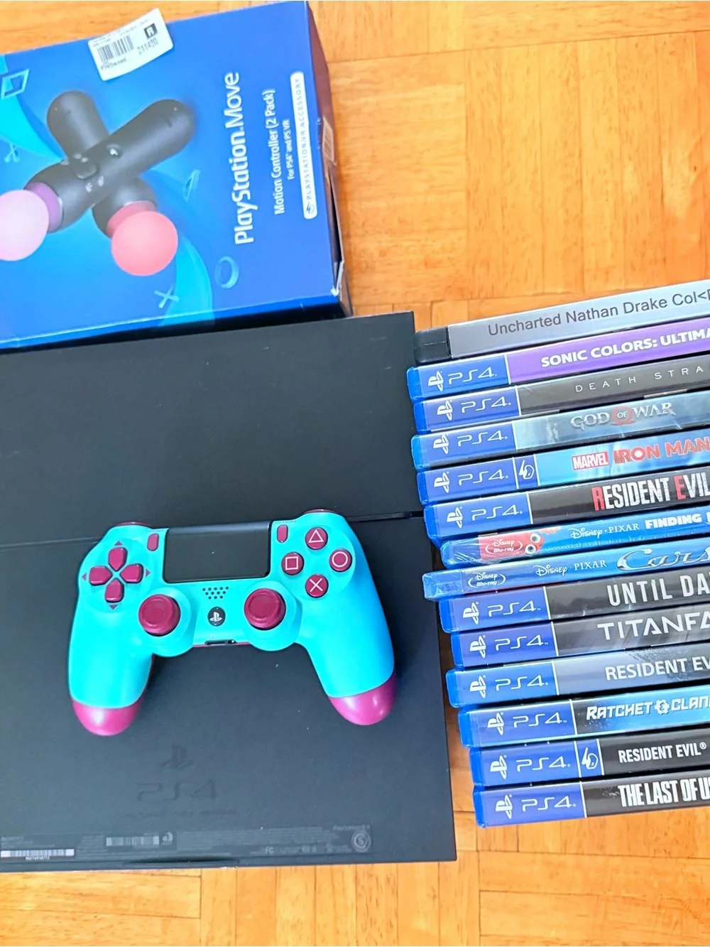 Sony PS4 Console with Turquoise & Pink DualShock Controller and Game Bundle